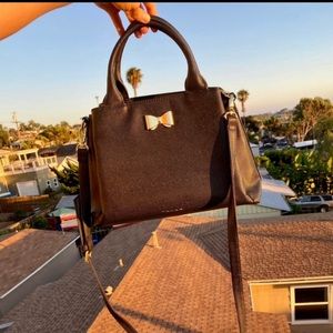 Tahari bow bag with logo on the front very cute